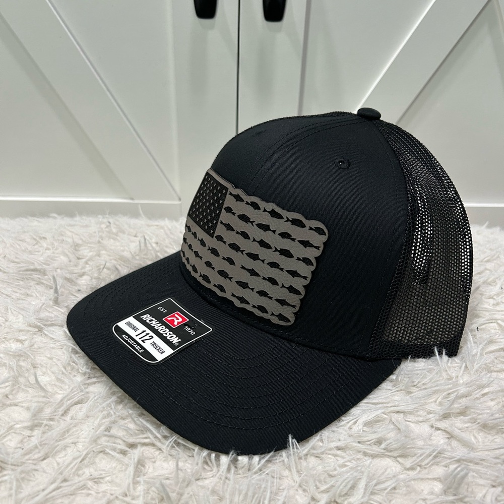 Laser engraved American flag fish. Richardson 112 trucker hat.